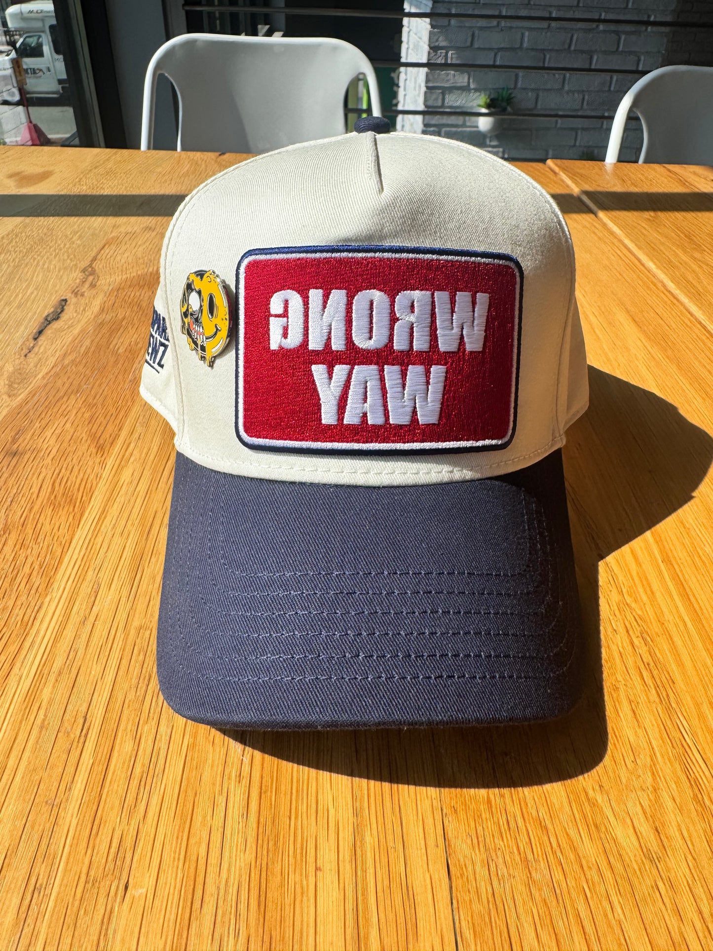 Exclusive Duality Smiley Face pin on Snapback